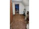 Attic area featuring wood flooring, white walls, an open closet and assorted decor at 3546 Stierwalt Rd, Quincy, IN 47456