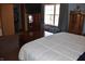 Bedroom with a king bed, walk-in closet, and natural light at 3546 Stierwalt Rd, Quincy, IN 47456