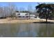 Charming single Gathering home with a lake in front at 3546 Stierwalt Rd, Quincy, IN 47456