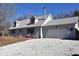 Ranch style home with an attached two car garage and a gravel driveway at 3546 Stierwalt Rd, Quincy, IN 47456