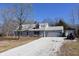 Ranch style home with gravel drive and two-car attached garage at 3546 Stierwalt Rd, Quincy, IN 47456