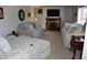 Bright living room featuring neutral walls, plush sofas, and a cozy fireplace at 3546 Stierwalt Rd, Quincy, IN 47456