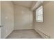 Finished basement with vinyl floors, window, and neutral paint at 4159 N Ridgeview Dr, Indianapolis, IN 46226