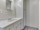 Bathroom features a marble top vanity, faucet, and storage unit at 4159 N Ridgeview Dr, Indianapolis, IN 46226