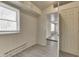 Neutral bedroom featuring wood-look floors and natural light from the window at 4159 N Ridgeview Dr, Indianapolis, IN 46226