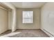 Bedroom featuring open closet, neutral paint and single window at 4159 N Ridgeview Dr, Indianapolis, IN 46226