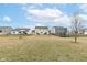 A large, grassy backyard offers ample space between neighboring houses at 4829 Penoyer Ln, Indianapolis, IN 46235