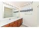 Bathroom has double sinks and an enclosed shower at 4829 Penoyer Ln, Indianapolis, IN 46235