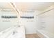 Bathroom with double sink vanity, shower and tub combination, and large mirror offers convenience at 4829 Penoyer Ln, Indianapolis, IN 46235