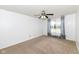 Bedroom with carpet, ceiling fan, and bright window at 4829 Penoyer Ln, Indianapolis, IN 46235