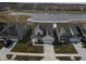 A beautiful aerial view of the home showcasing the neighborhood and nearby pond at 488 Ehrlich Ln, Westfield, IN 46069