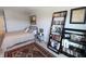 Cozy bedroom with twin bed, decorative rug and convenient bookcase for extra storage at 488 Ehrlich Ln, Westfield, IN 46069