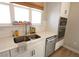 Bright kitchen featuring a double sink, white countertops, and modern stainless-steel appliances at 488 Ehrlich Ln, Westfield, IN 46069