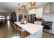 Spacious kitchen with a large center island, stainless appliances, and ample cabinet space at 488 Ehrlich Ln, Westfield, IN 46069