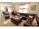Comfortable living room featuring a leather sectional sofa and neutral decor at 488 Ehrlich Ln, Westfield, IN 46069