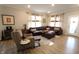Comfortable living room featuring a large leather sectional sofa and neutral decor at 488 Ehrlich Ln, Westfield, IN 46069