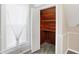 A cedar closet with shelving provides storage and protection for clothing and linens at 505 W Washington St, Shelbyville, IN 46176