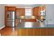 Kitchen with stainless steel appliances, wood cabinets, and butcher block island at 505 W Washington St, Shelbyville, IN 46176