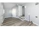 Large basement with gray walls, light ceiling, wood-look flooring, and utility connections at 516 W Washington St, Lebanon, IN 46052