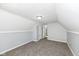 Carpeted bedroom with gray walls and a doorway at 516 W Washington St, Lebanon, IN 46052