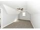 Cozy carpeted bedroom with a window and ceiling fan at 516 W Washington St, Lebanon, IN 46052