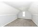 Bedroom featuring gray walls and carpet with a window at 516 W Washington St, Lebanon, IN 46052