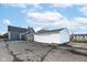 Detached two-car garage with white siding, visible from the property's backyard at 516 W Washington St, Lebanon, IN 46052