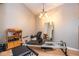 Bonus room features high ceilings, a pilates machine, and a storage shelf at 5629 Crittenden Ave, Indianapolis, IN 46220