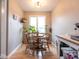 Cozy dining area with wood floors and plenty of natural light at 5629 Crittenden Ave, Indianapolis, IN 46220