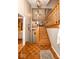 Inviting foyer with hardwood floors and staircase to the second level at 5629 Crittenden Ave, Indianapolis, IN 46220