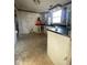 Bright kitchen featuring laminate countertops and natural light, ready for renovation and new appliances at 6944 E 300 S, Greenfield, IN 46140
