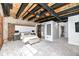 Bedroom with exposed brick walls, wood ceilings, beams and glass block at 735 Lexington Ave # 30, Indianapolis, IN 46203