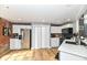 Updated kitchen featuring stainless steel appliances, white cabinets, and wood floors at 735 Lexington Ave # 30, Indianapolis, IN 46203