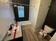 Modern bathroom featuring a stylish vanity, bathtub, and toilet at 744 Wallace Ave, Indianapolis, IN 46201