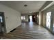 Spacious, light-filled living area leading to a charming doorway at 744 Wallace Ave, Indianapolis, IN 46201