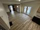 Open floor plan living room and modern finishings with hardwood floors at 744 Wallace Ave, Indianapolis, IN 46201