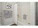 Well-lit bathroom featuring a bathtub with shower, and neutral paint and accents at 8015 Sargent Rdg, Indianapolis, IN 46256