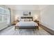 Comfortable bedroom with a neutral color palette, lots of natural light, and a cozy atmosphere at 8015 Sargent Rdg, Indianapolis, IN 46256
