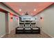 Basement home theater with comfortable seating and ambient lighting at 8015 Sargent Rdg, Indianapolis, IN 46256