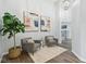 Welcoming living room with elegant decor and ample natural light, creating a cozy and stylish space at 8015 Sargent Rdg, Indianapolis, IN 46256