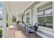 Welcoming front porch with comfortable seating, decorative plants, and stylish decor at 8015 Sargent Rdg, Indianapolis, IN 46256