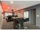 Finished basement theater room with leather recliners, bar table and projector screen at 8015 Sargent Rdg, Indianapolis, IN 46256
