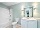 Bathroom featuring a shower over the tub, neutral color, and a bright vanity at 8061 Lower Bay Ln # 1, Indianapolis, IN 46236