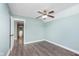 Bedroom with durable floors, vaulted ceiling, and natural lighting at 8061 Lower Bay Ln # 1, Indianapolis, IN 46236
