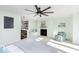 Bedroom with sitting area and fireplace near a modern style bathroom at 8061 Lower Bay Ln # 1, Indianapolis, IN 46236