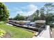 Community docks with multiple boat slips and green space nearby at 8061 Lower Bay Ln # 1, Indianapolis, IN 46236