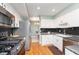 Well-equipped kitchen featuring stainless steel appliances and granite countertops for a modern look at 8061 Lower Bay Ln # 1, Indianapolis, IN 46236