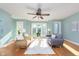 Bright living room with hardwood floors, natural light and stylish furnishings create an inviting atmosphere at 8061 Lower Bay Ln # 1, Indianapolis, IN 46236