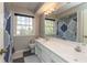 Bathroom with double sink vanity and large window at 9080 Dewberry Ct, Indianapolis, IN 46260