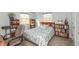 Bright bedroom with multiple windows, carpeting, and shelves at 9080 Dewberry Ct, Indianapolis, IN 46260